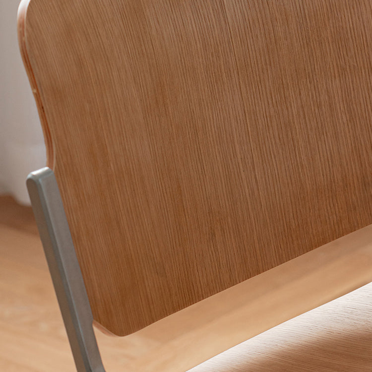 Silla de comedor estilo moderno sin brazos con respaldo abierto y patas de metal