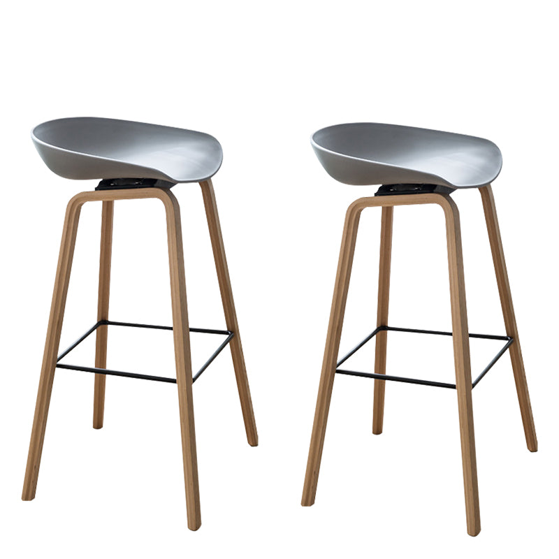 Moderne plastic tegenstoel voetsteun lage rug bucket coffeeshop barkruk met houten benen