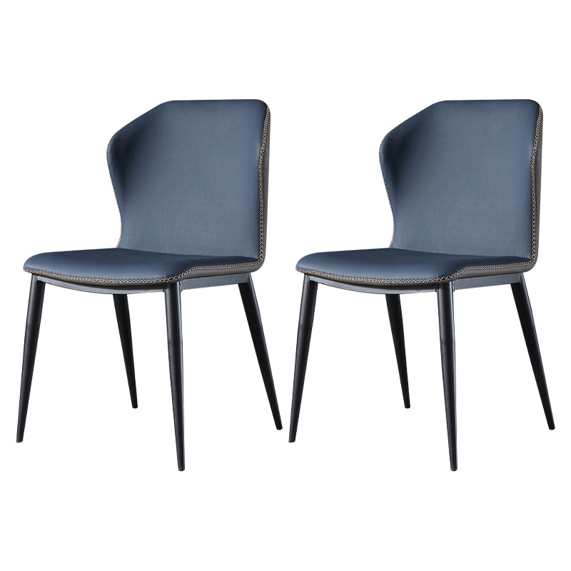 Silla lateral contemporánea con respaldo de orejas Silla sin brazos curvada de cuero con acabado mate