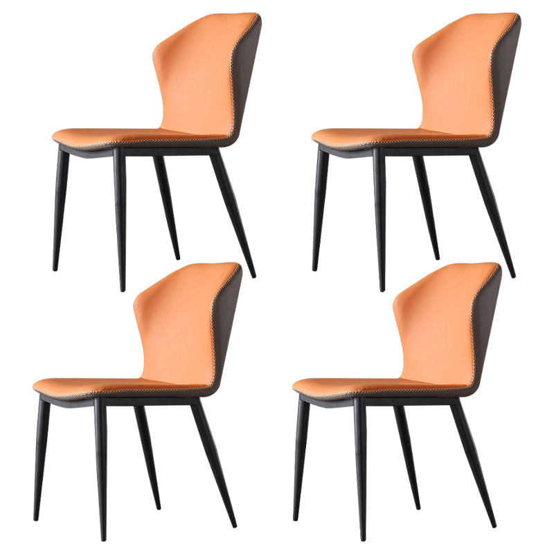 Silla lateral contemporánea con respaldo de orejas Silla sin brazos curvada de cuero con acabado mate