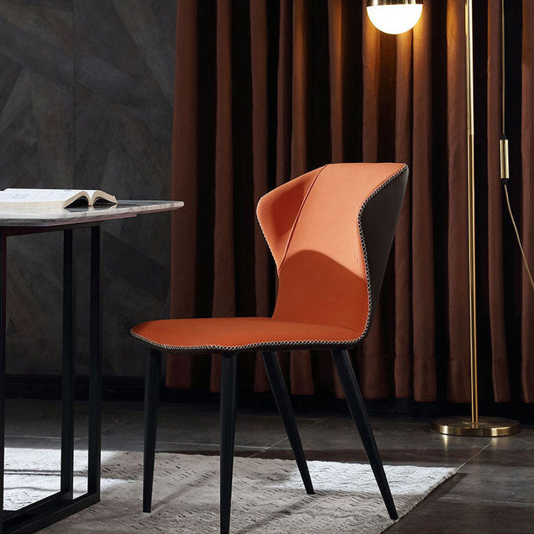 Silla lateral de cuero contemporánea para restaurante Sillas de comedor con respaldo orejero