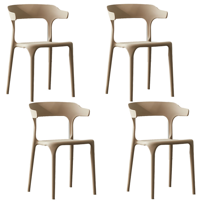 Silla lateral apilable de plástico escandinavo con respaldo abierto y acabado mate