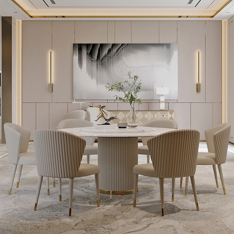 Mesa de comedor de piedra sinterizada mesa redonda de lujo con pedestal de metal en blanco