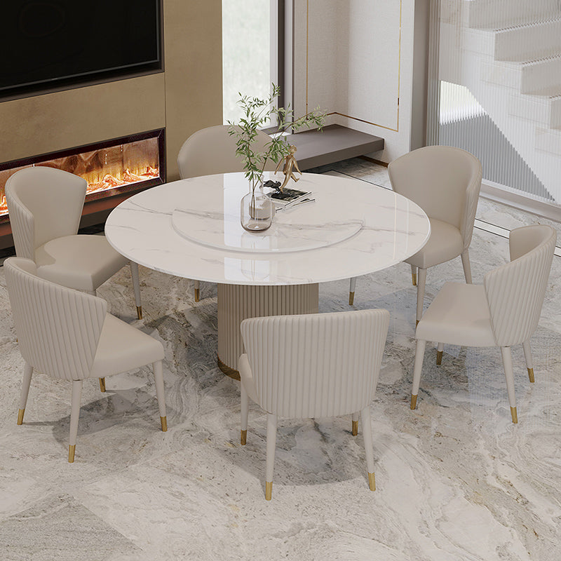 Mesa de comedor de piedra sinterizada mesa redonda de lujo con pedestal de metal en blanco