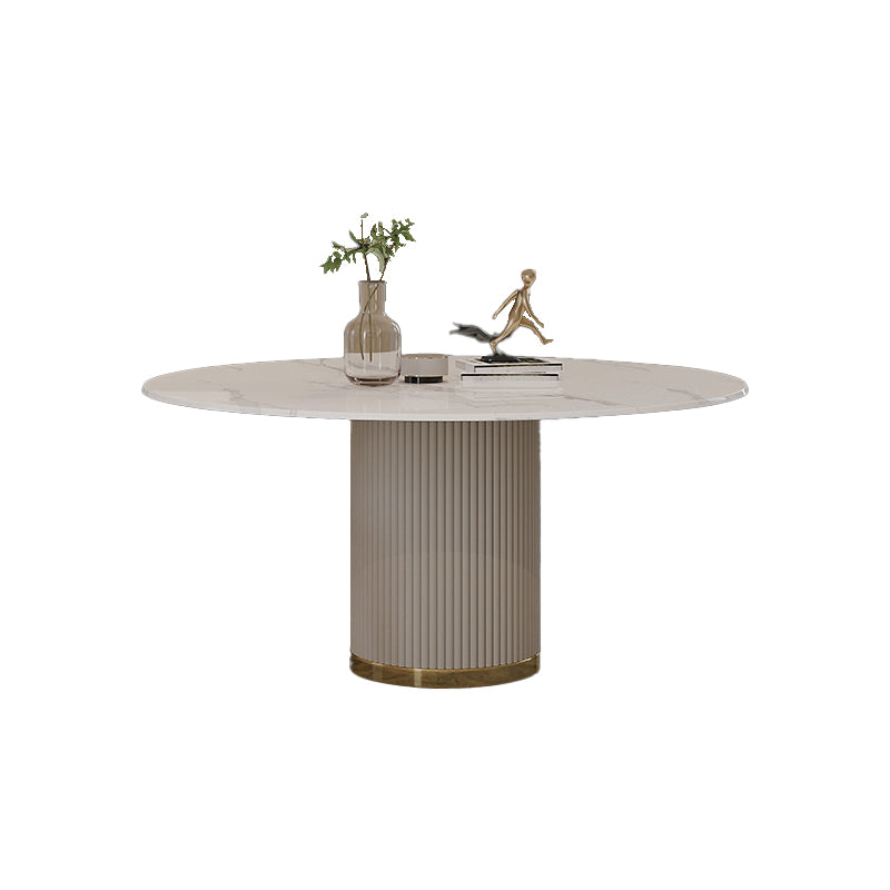 Mesa de comedor de piedra sinterizada mesa redonda de lujo con pedestal de metal en blanco