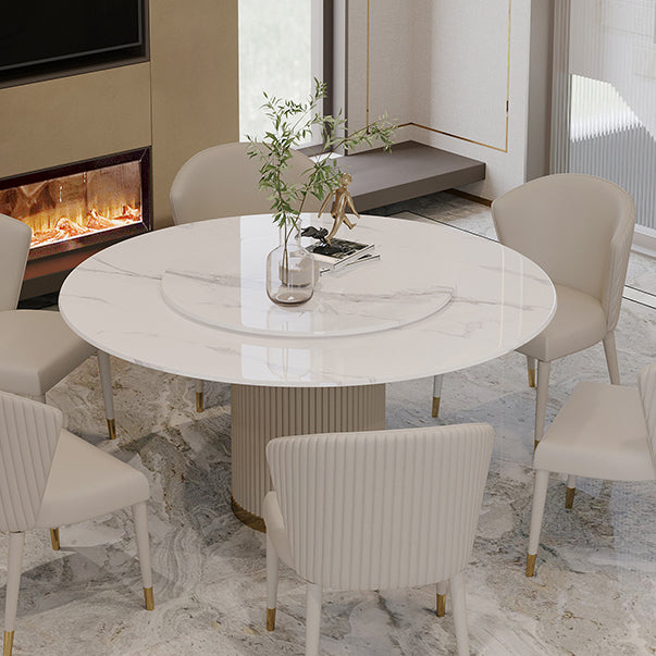 Mesa de comedor de piedra sinterizada mesa redonda de lujo con pedestal de metal en blanco