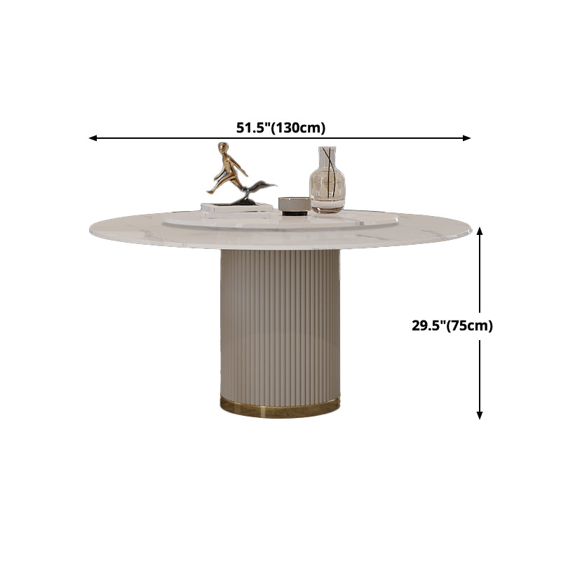 Mesa de comedor de piedra sinterizada mesa redonda de lujo con pedestal de metal en blanco