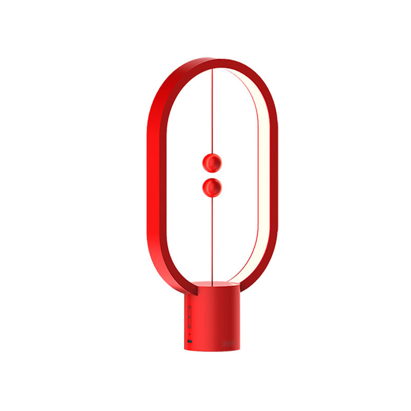 Lampada da tavolo ovale in stile moderno colorato lampada da scrivania a led singola per camera da letto