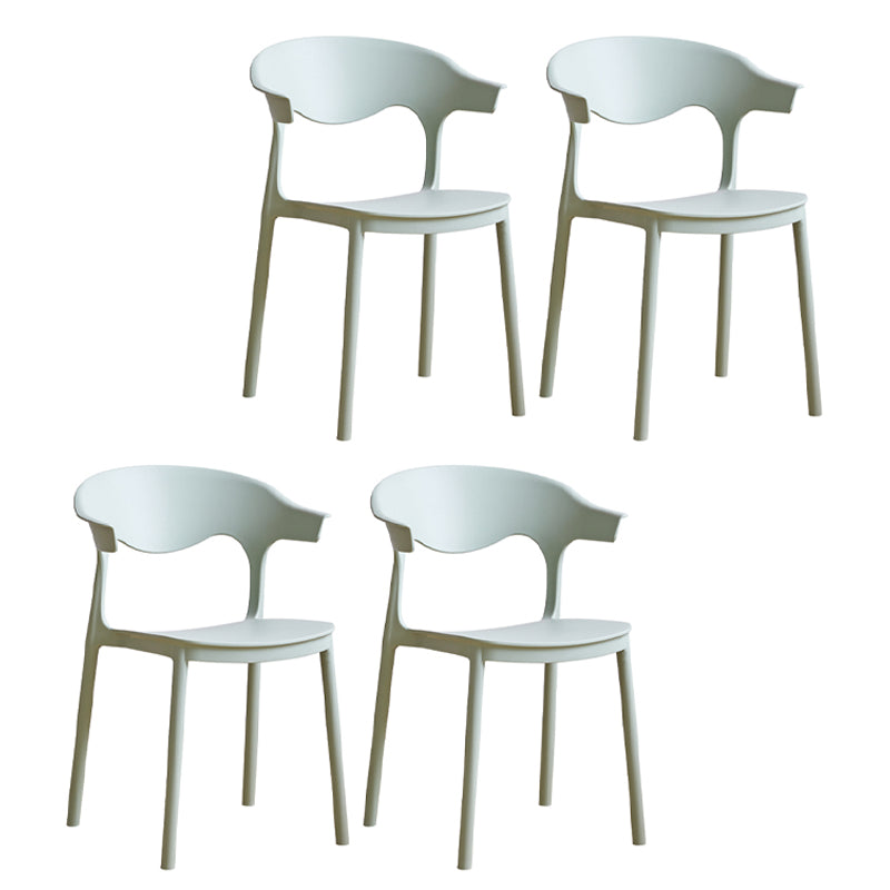 El plástico contemporáneo que cena la parte posterior abierta apilable de las sillas sin brazos cena la silla lateral