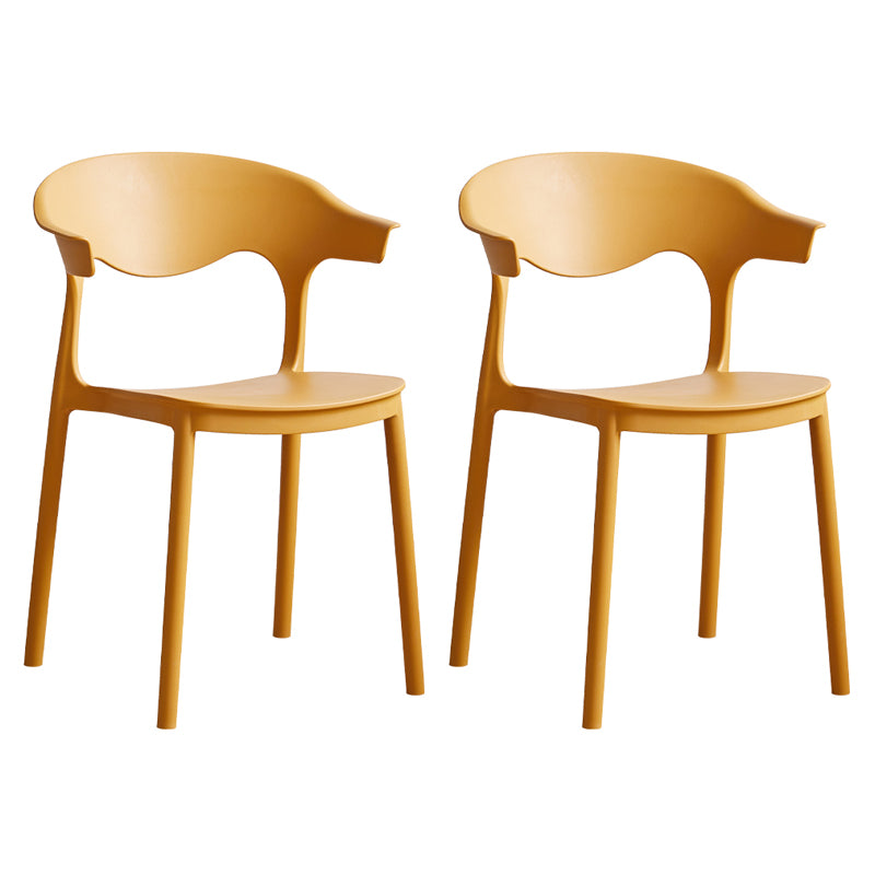 El plástico contemporáneo que cena la parte posterior abierta apilable de las sillas sin brazos cena la silla lateral