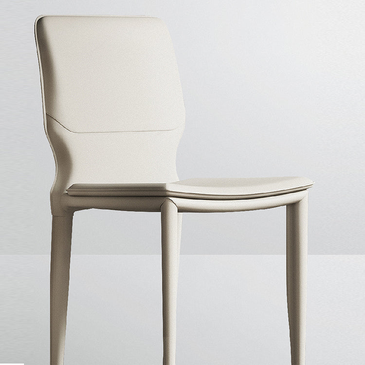 Sillas laterales contemporáneas sin brazos con respaldo sólido Sillas de comedor de cuero