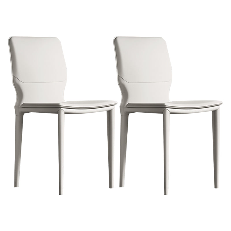Sillas laterales contemporáneas sin brazos con respaldo sólido Sillas de comedor de cuero