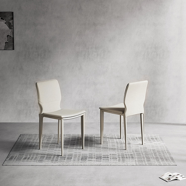 Sillas laterales contemporáneas sin brazos con respaldo sólido Sillas de comedor de cuero