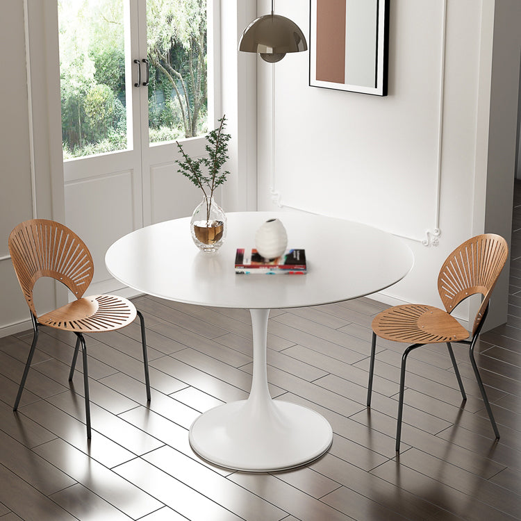 Dinettetafel in eigentijdse stijl, rond stenen meubilair met tulponderstel
