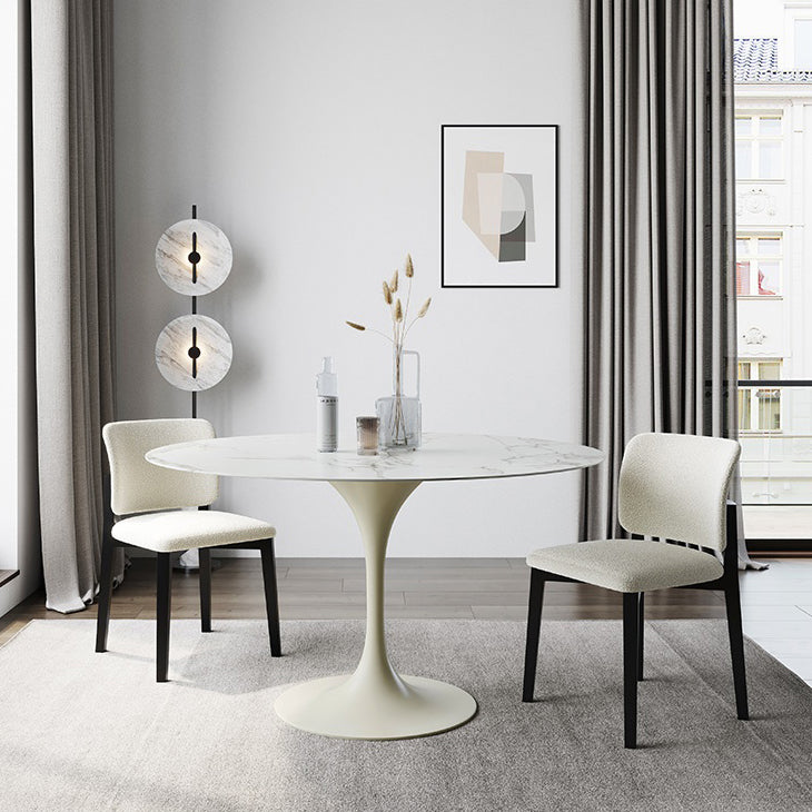 Dinettetafel in eigentijdse stijl, rond stenen meubilair met tulponderstel