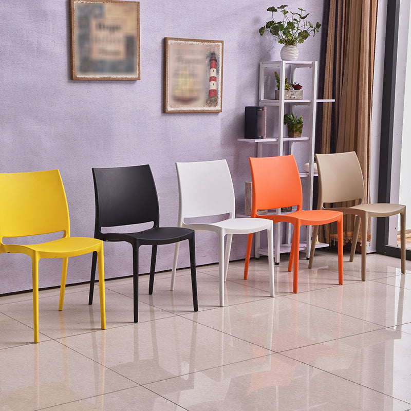 Silla lateral de comedor escandinava sin brazos con respaldo abierto Sillas laterales de comedor de plástico