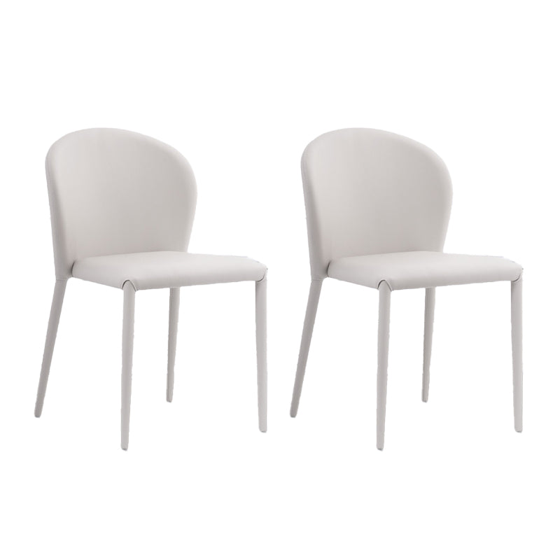 Minimalistische stijl armloze vaste achterzijde stoelen lederen eetkamerstoelen voor thuis