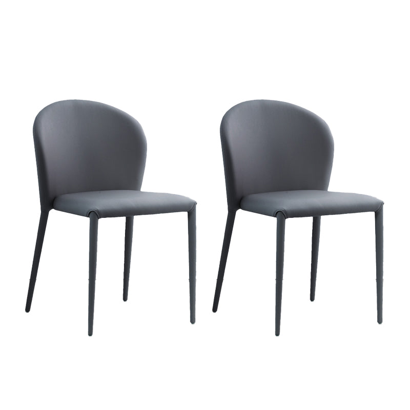 Minimalistische stijl armloze vaste achterzijde stoelen lederen eetkamerstoelen voor thuis