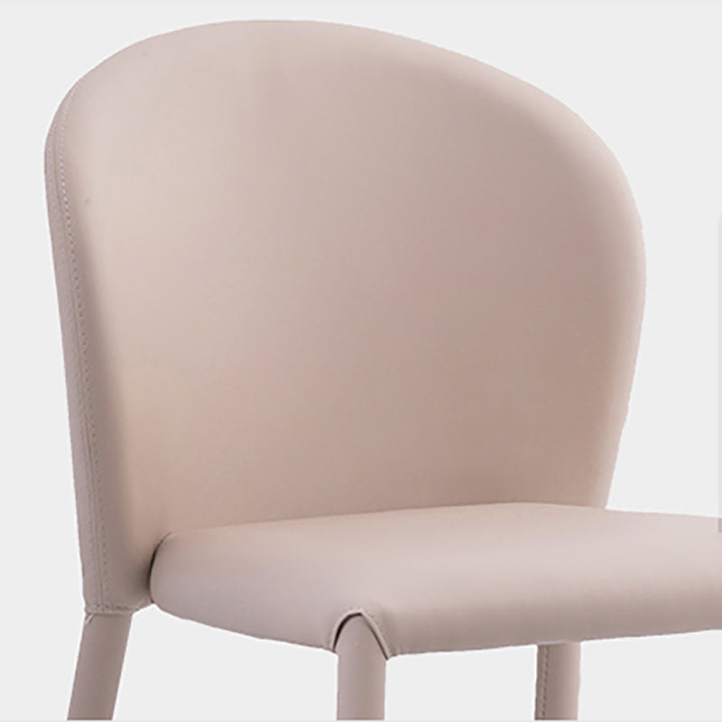 Minimalistische stijl armloze vaste achterzijde stoelen lederen eetkamerstoelen voor thuis