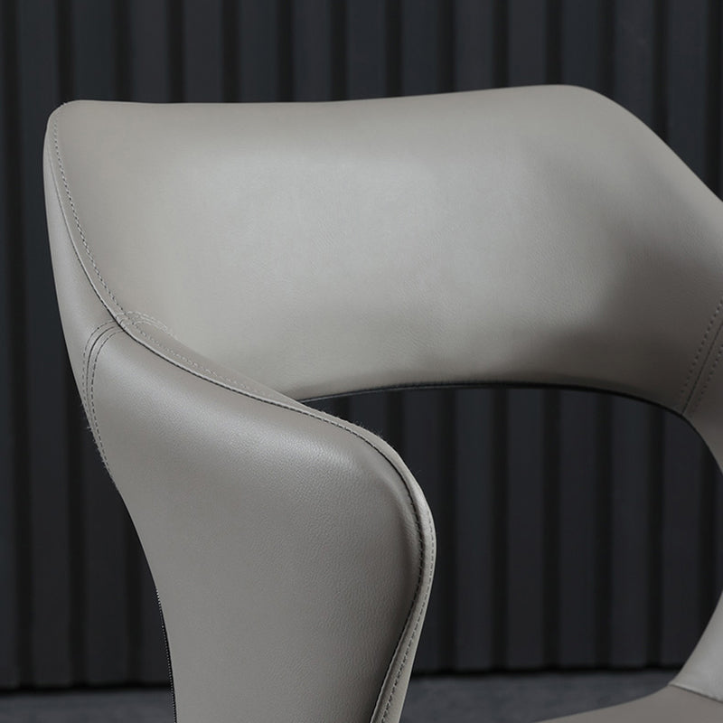 Silla de comedor contemporánea de cuero con respaldo abierto y patas negras