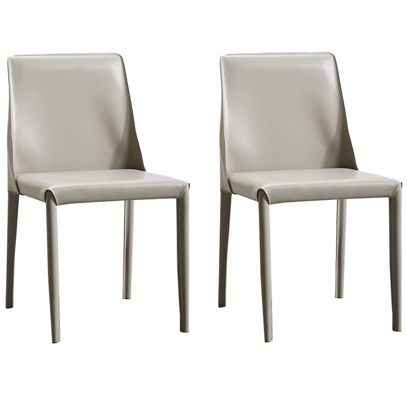 Sillas laterales de comedor de cuero de estilo moderno, sillas sin brazos con respaldo sólido con acabado mate