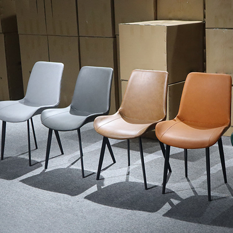 Silla lateral de cuero contemporánea para restaurante Silla de comedor con respaldo sólido