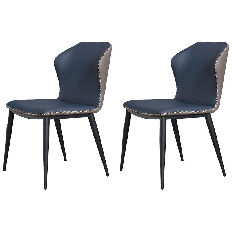 Moderne stijl Wingback-stoel Armloze leren eetkamerstoelen voor thuis