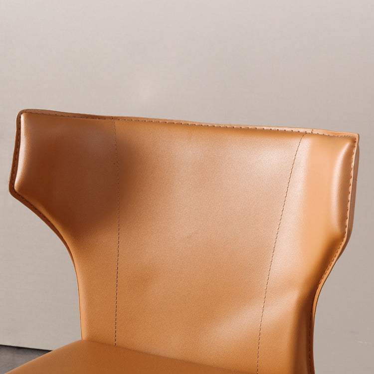 Silla lateral moderna con respaldo de orejas, silla de cuero con acabado mate para comedor
