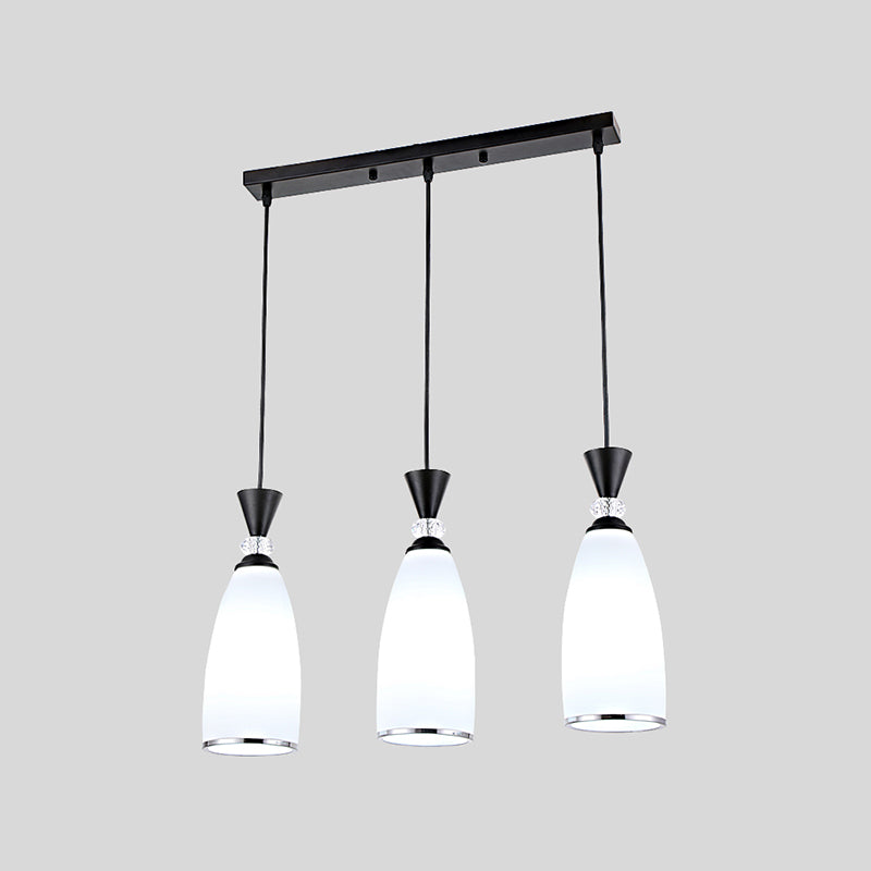 Salle à manger suspendue pendante de style moderne avec une teinte en verre blanc