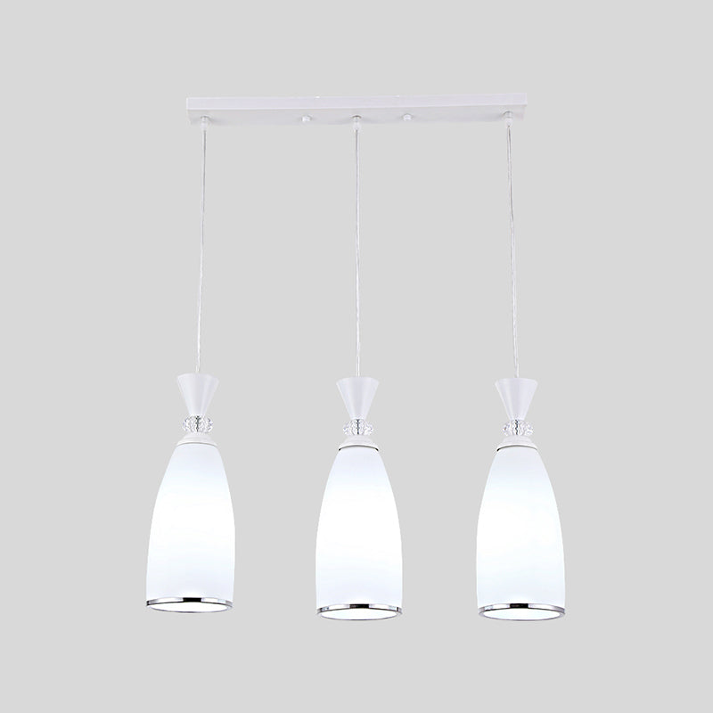 Salle à manger suspendue pendante de style moderne avec une teinte en verre blanc