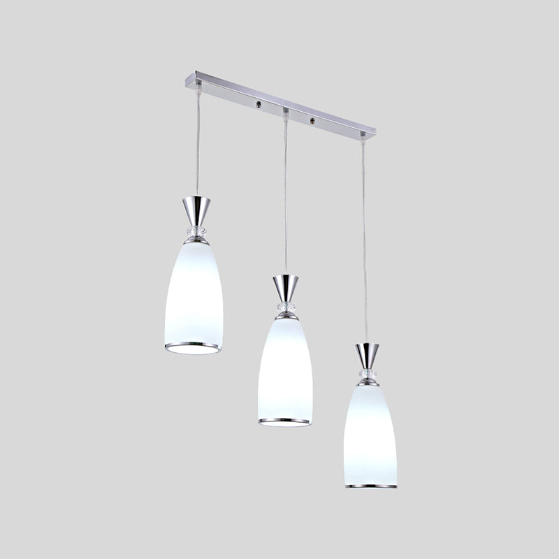 Salle à manger suspendue pendante de style moderne avec une teinte en verre blanc