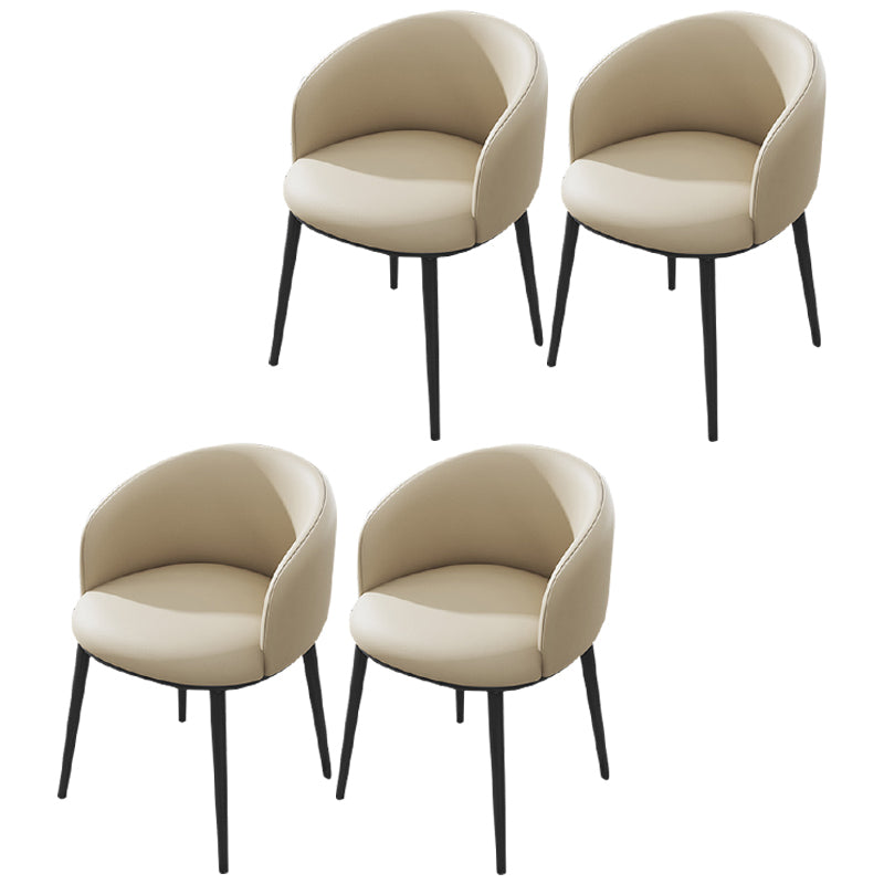 Silla de comedor tapizada moderna con respaldo sólido y acabado mate