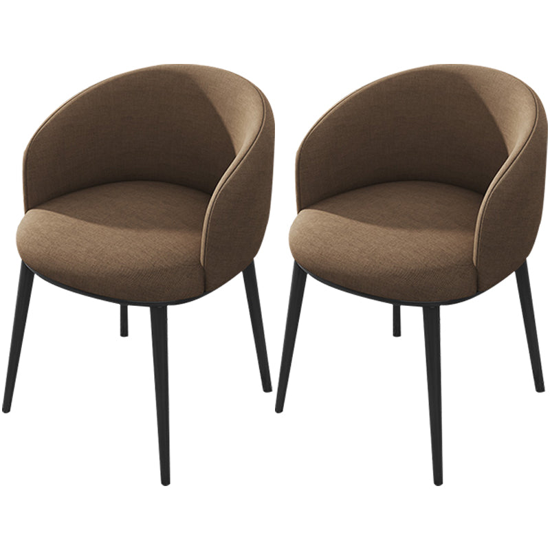Silla de comedor tapizada moderna con respaldo sólido y acabado mate