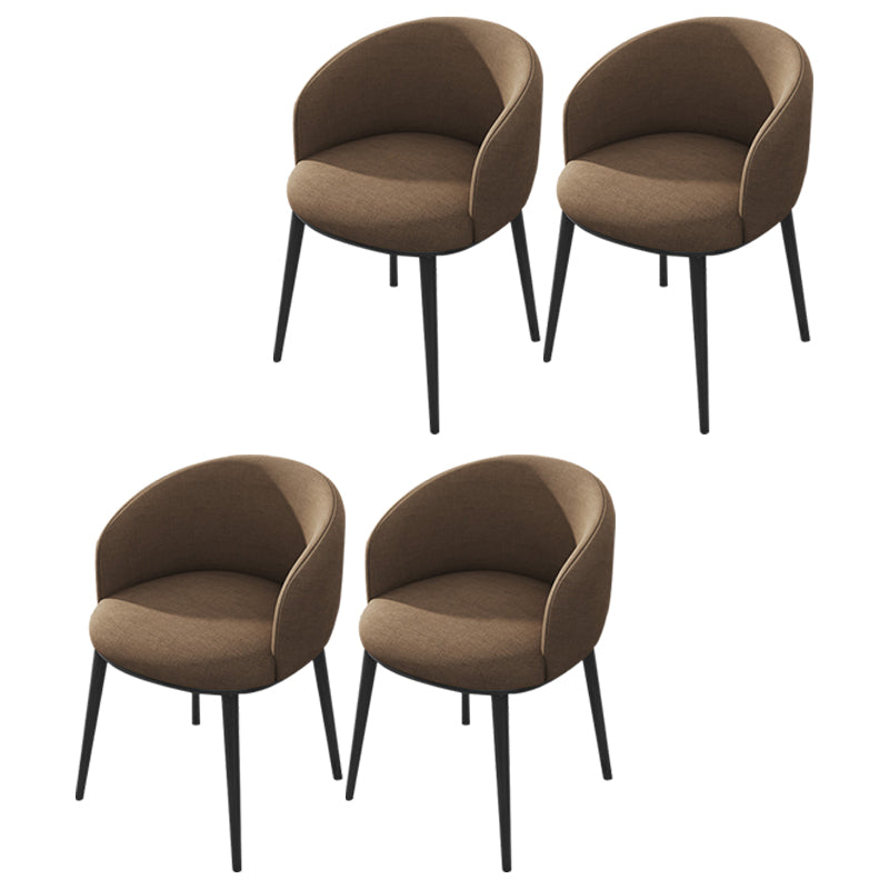 Silla de comedor tapizada moderna con respaldo sólido y acabado mate
