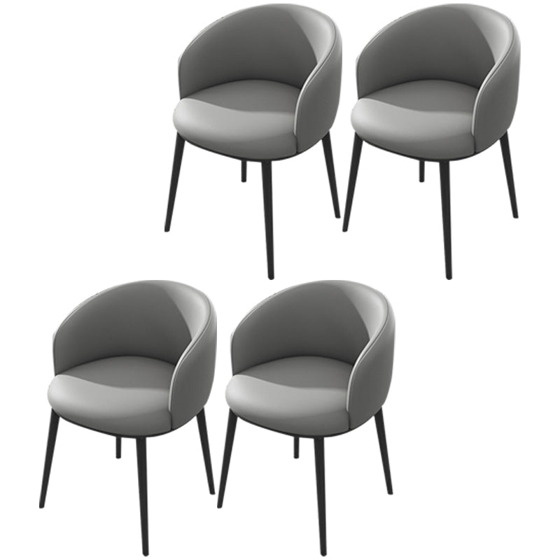 Silla de comedor tapizada moderna con respaldo sólido y acabado mate