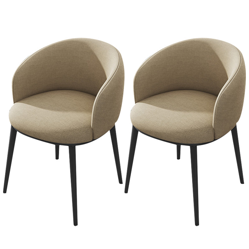 Silla de comedor tapizada moderna con respaldo sólido y acabado mate
