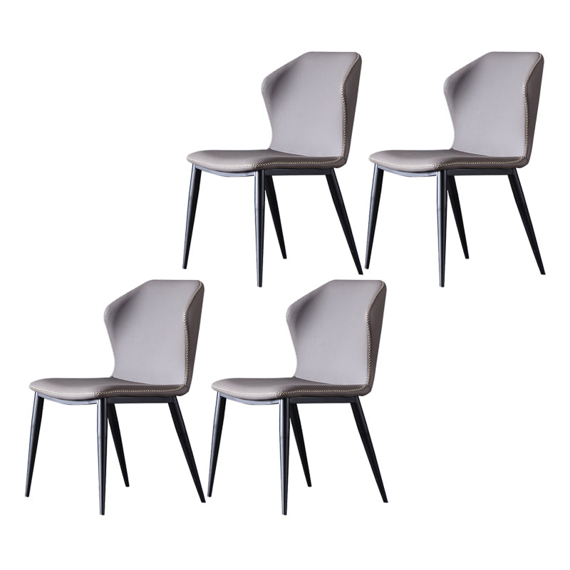 El lado sin brazos del diseño contemporáneo preside el cuero que cena la silla lateral
