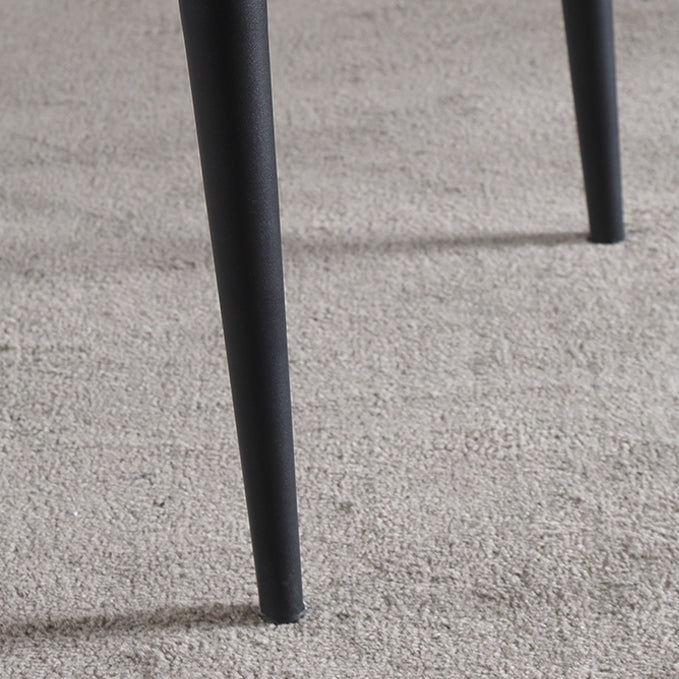 El lado sin brazos del diseño contemporáneo preside el cuero que cena la silla lateral