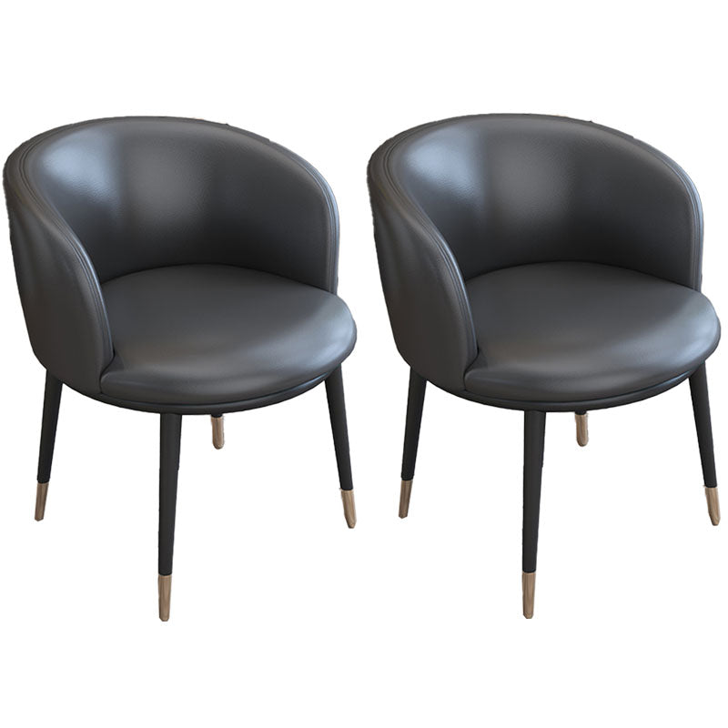 Silla de comedor de cuero con respaldo sólido y acabado mate para el hogar contemporáneo