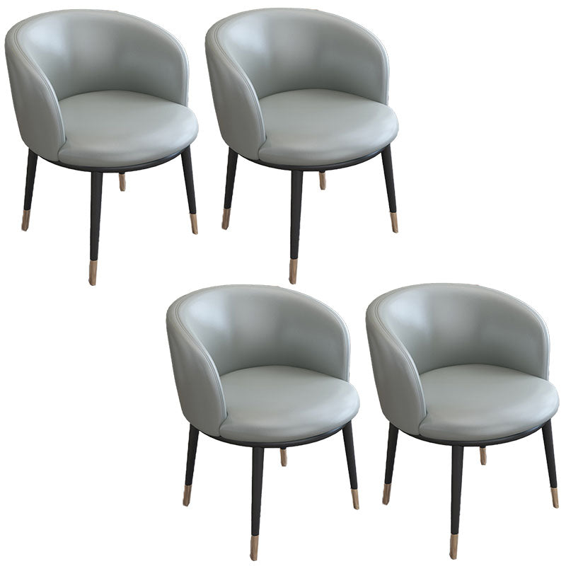 Silla de comedor de cuero con respaldo sólido y acabado mate para el hogar contemporáneo
