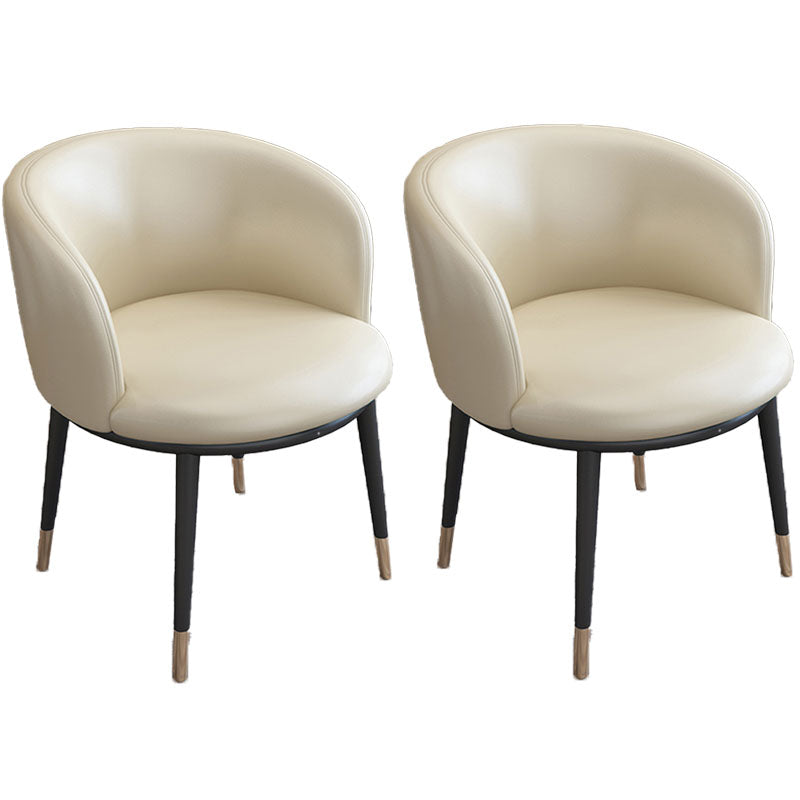 Silla de comedor de cuero con respaldo sólido y acabado mate para el hogar contemporáneo