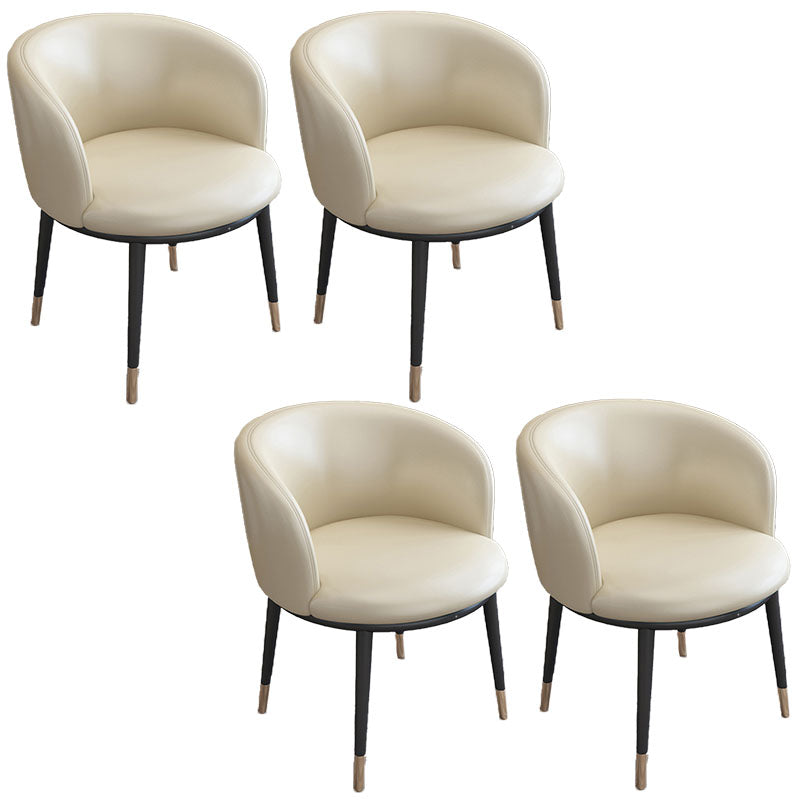 Silla de comedor de cuero con respaldo sólido y acabado mate para el hogar contemporáneo