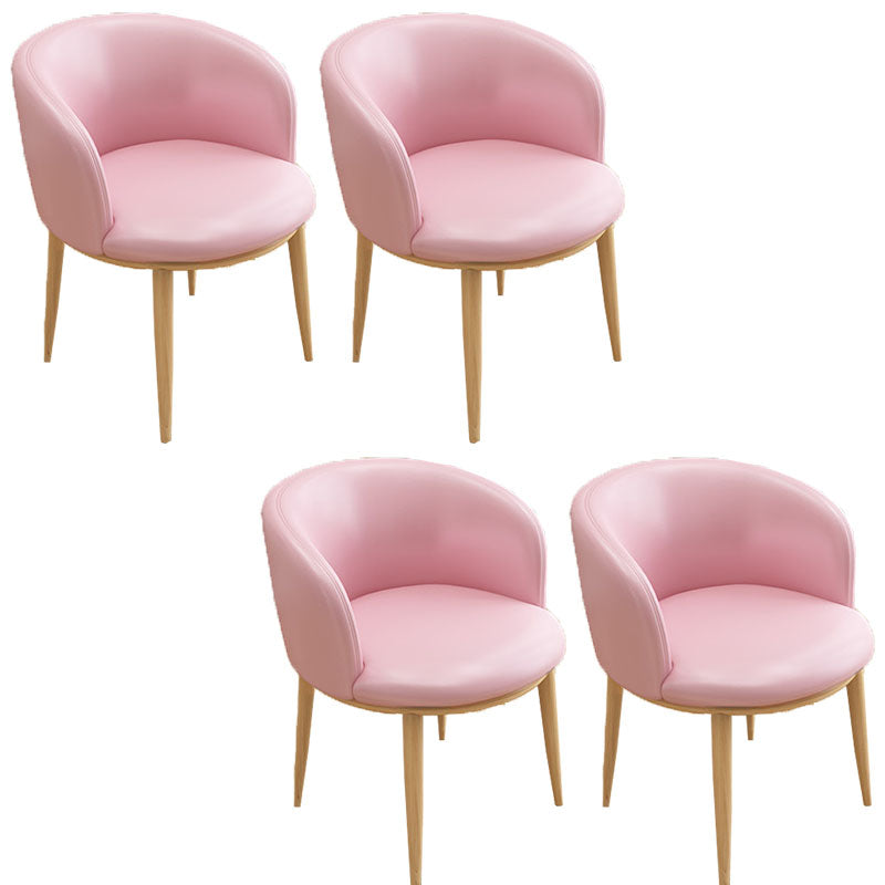 Silla de comedor de cuero con respaldo sólido y acabado mate para el hogar contemporáneo