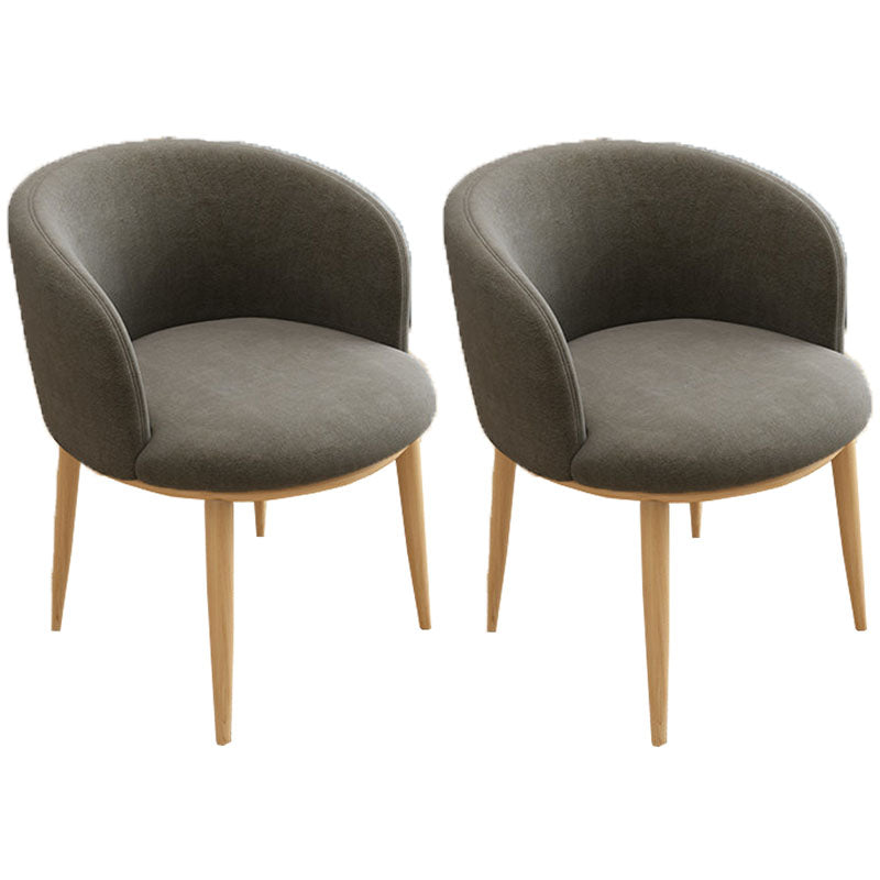 Silla de comedor de cuero con respaldo sólido y acabado mate para el hogar contemporáneo