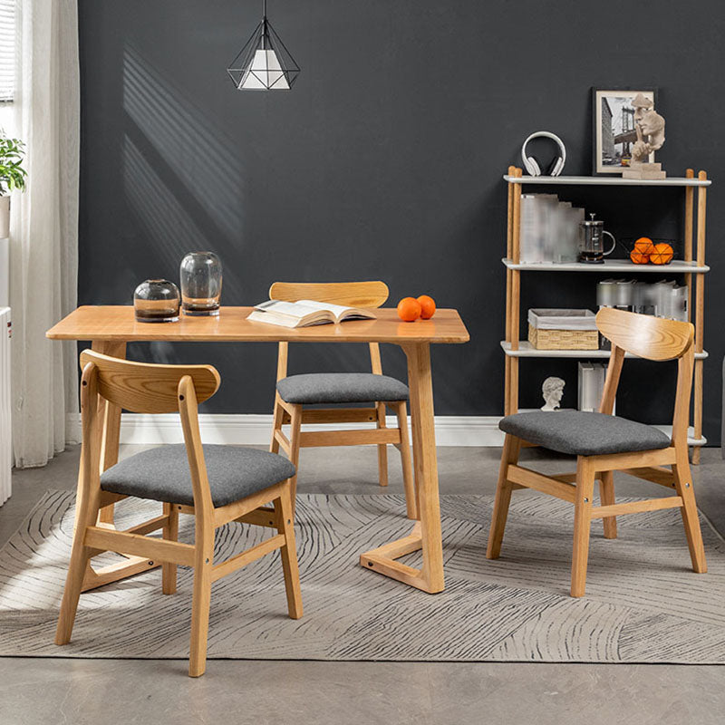 Silla lateral casera tapizada escandinava Silla de comedor natural con respaldo abierto