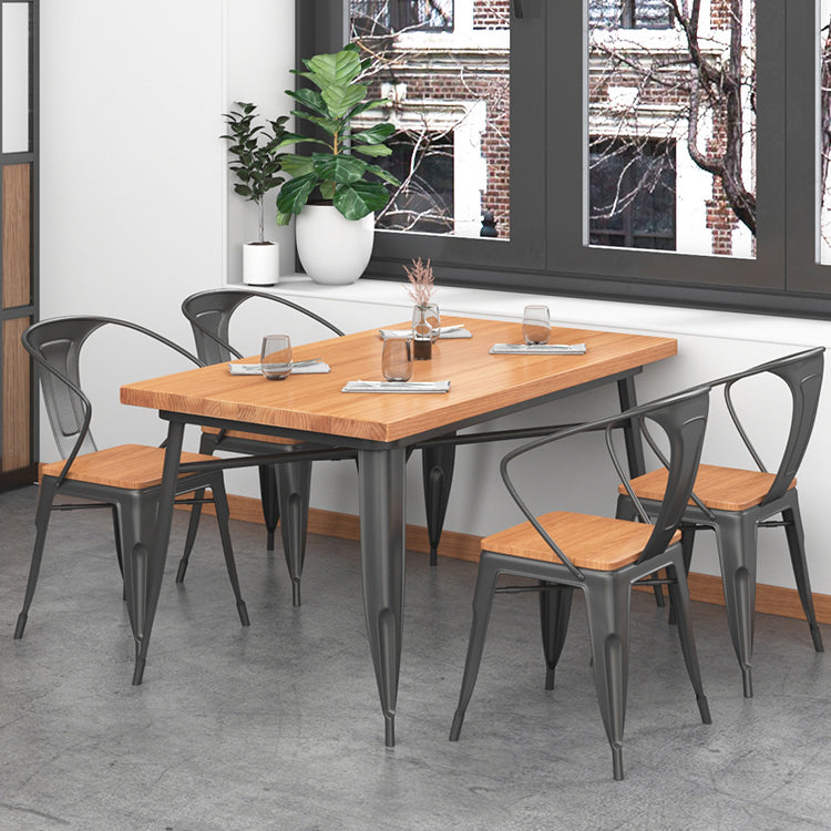 Mesa de comedor de madera sólida Mesa de comedor industrial de 4 patas con base de metal