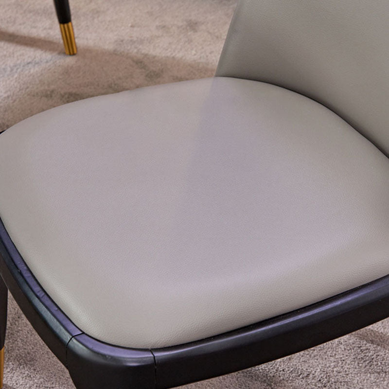 Silla de comedor contemporánea sin brazos Silla Parsons curvada de cuero con acabado mate