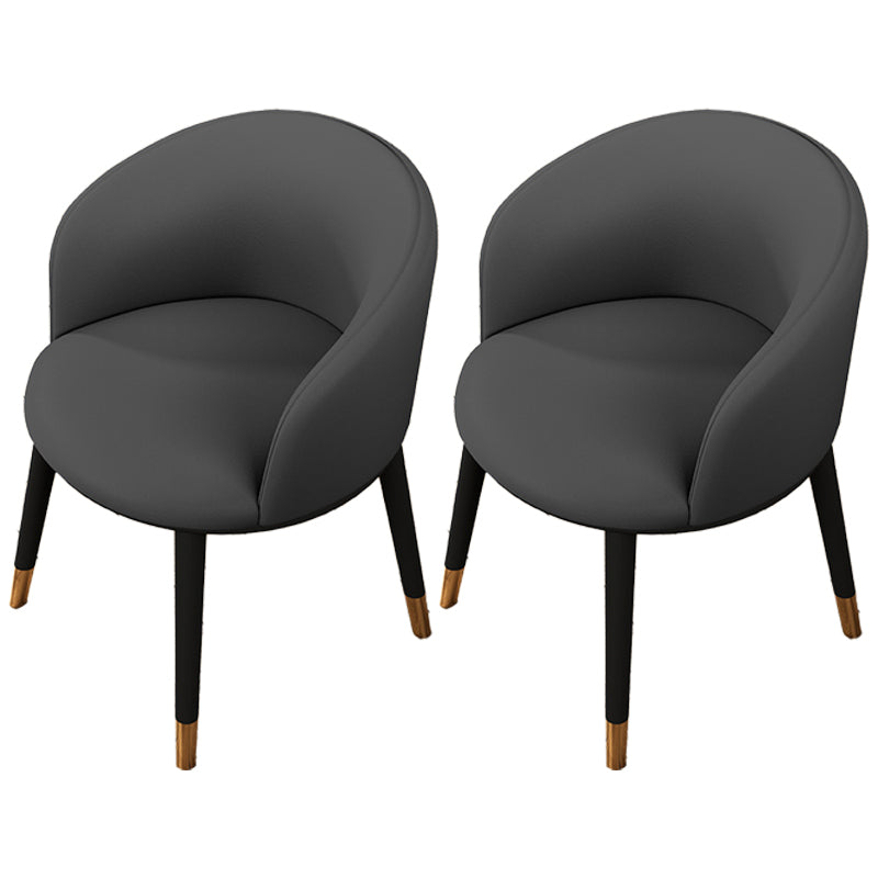 Silla de comedor tapizada moderna con respaldo sólido y acabado mate