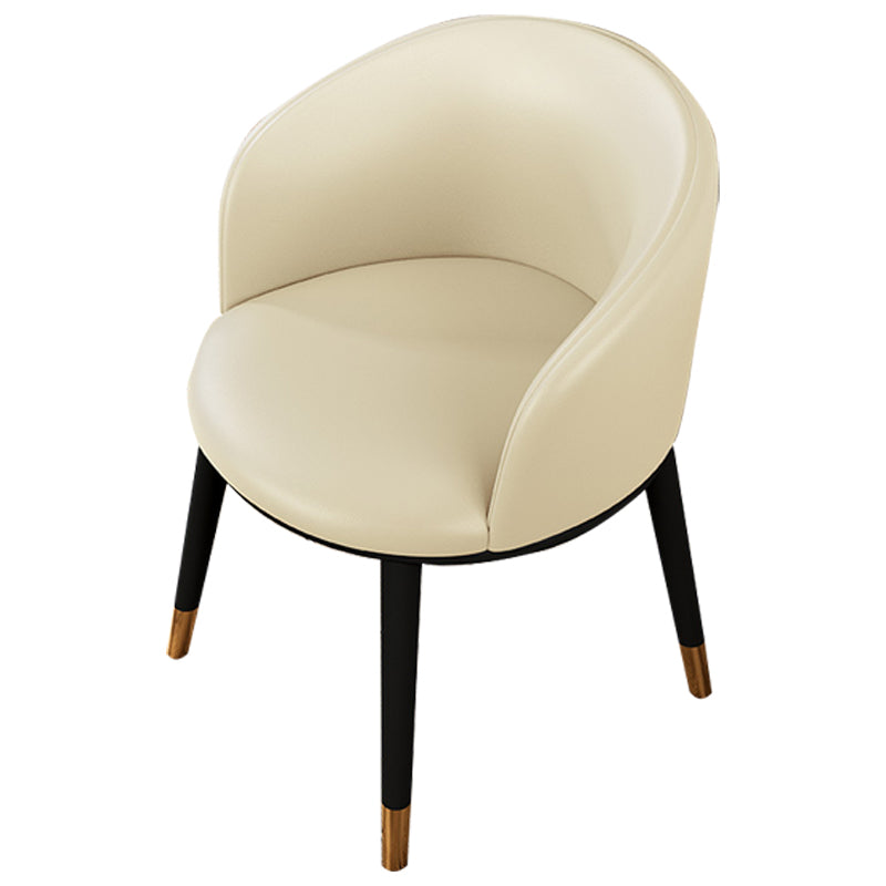 Silla de comedor tapizada moderna con respaldo sólido y acabado mate