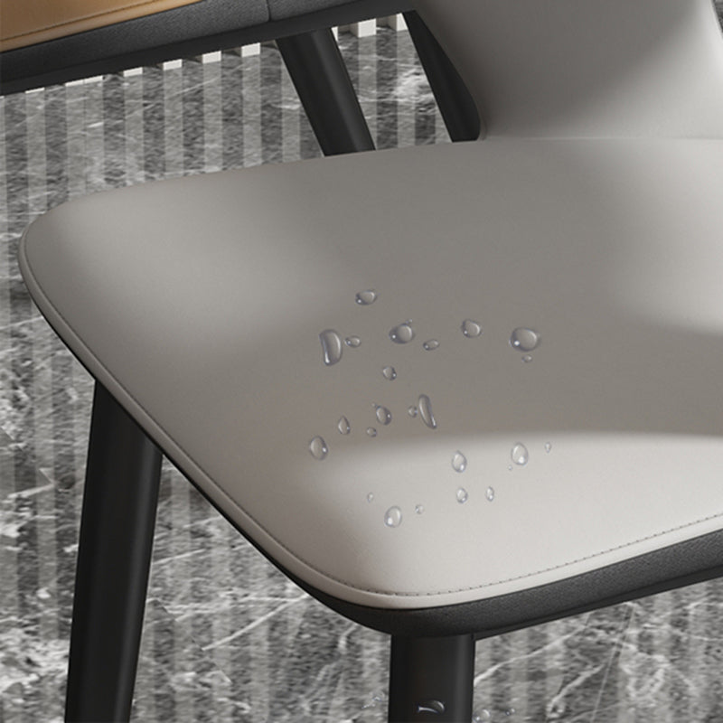 Silla de comedor contemporánea, sillón con respaldo abierto curvado de cuero con acabado mate